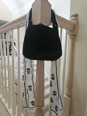 Chic Black Shoulder Bag with Printed Scarf Accent
